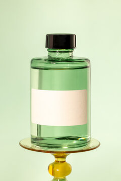 Elegant mockup of an empty glass container for scented oil serum