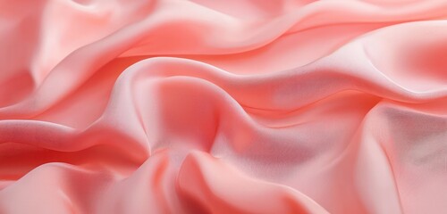 Fototapeta premium Coral tones gently transition to soft peach and blush pink, with a textured finish creating a sophisticated and elegant gradient.