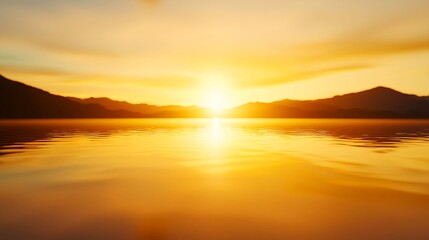 Fototapeta premium Golden Sunset Over Calm Water And Mountains