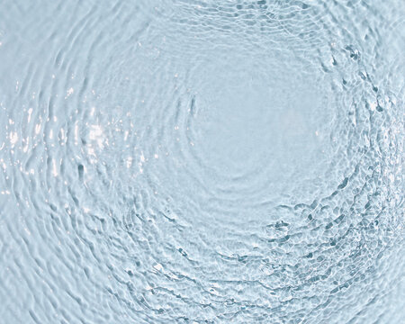 Calm aqua surface with soft rippling patterns