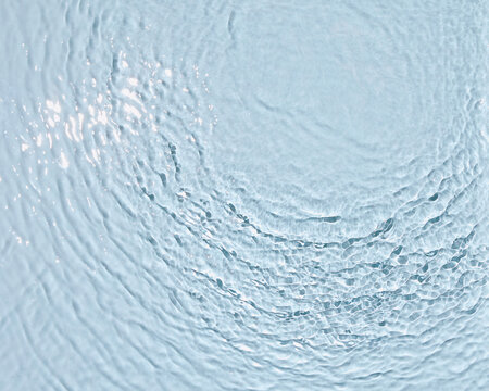 Gentle ripples on tranquil water surface