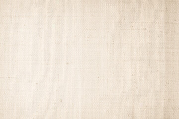 Brown sackcloth woven texture background in natural pattern. Jute hessian burlap, linen background in light beige cream color blank. Weaving canvas fiber line cotton cloth textured as organic.