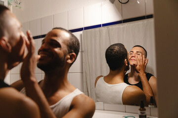 Couple Sharing a Joyful Skincare Moment