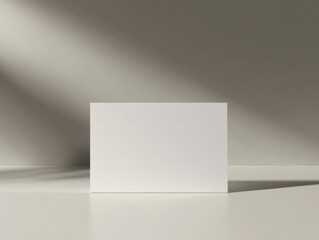 Minimalist Blank White Card Mockup Presentation with Shadow Play for Product Display or Text
