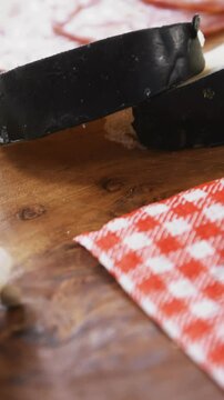 Cheese with ham on wooden board