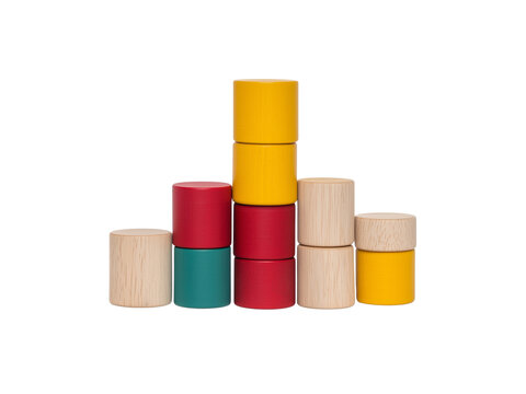 A collection of colorful wooden blocks arranged in a playful, ascending pattern, Isolated on white background.