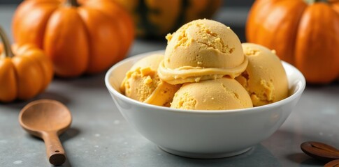 White bowl with pumpkin ice cream and pumpkin, fall flavors, pumpkin ice cream, pumpkin pie filling