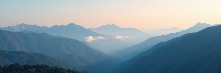 Light grey clouds gently roll across the mountain range at dawn, grey, peaceful, gentle