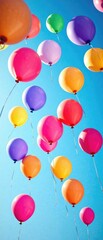Vibrant balloons floating in a bright blue sky , bright blue, clouds