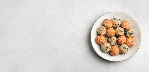 Korean Rice Balls (Jumeokbap) with kimchi and seaweed, top view, copy space