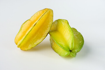 Fresh Yellow and Green Starfruit On a White Background