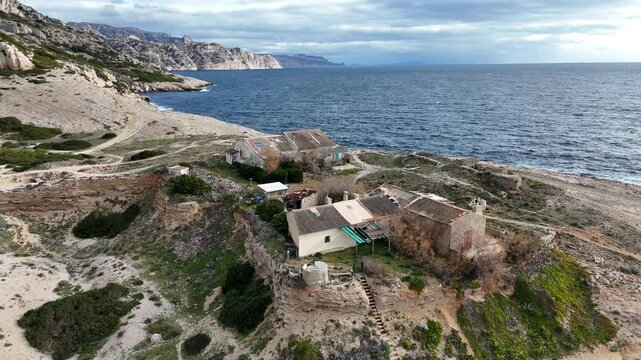 Calanques National Park protected area in South France drone approaching isolated house on the beach