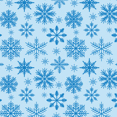 Snowflakes seamless pattern on a blue background. Vector illustration.