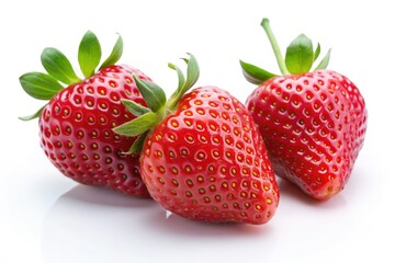Three perfect strawberries, vibrant red against a stark white, minimalist perfection.