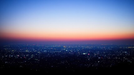 Obraz premium Blurred City Lights at Sunset, Pink and Blue Twilight Sky