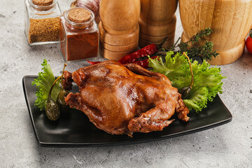Baked small chicken with spices