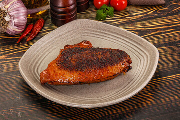 Roasted duck breast in cherry