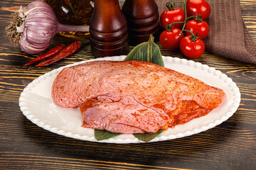 Raw marinated duck breast for cooking
