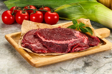 Raw beef cheeks cut for cooking