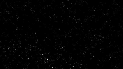 Star dust particles on black background. Starry night sky. Galaxy space background. Glowing stars in space. Night sky with plenty stars. Christmas, New Year and all celebration backgrounds concepts.