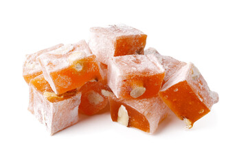 Turkish delight cubes coated with powdered sugar arranged on a white background