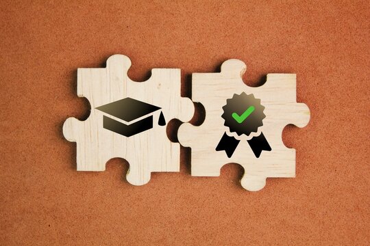 jigsaw puzzle with certification. qualifications, certificates and graduate icons. the concept of academic qualifications. the concept of required skills.