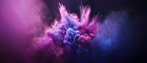 A vibrant explosion of colorful smoke in shades of pink, purple, and blue against a dark background, creating a dynamic and artistic visual effect.