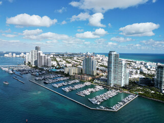Fototapeta premium Miami south beach view. Yacht club. Marina in Miami, Florida. Luxury yachts. Miami marina with luxury yacht. Summer vacation. Luxury South beach marina. Luxury yacht. Private marina slips