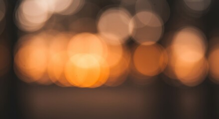Fototapeta premium Warm golden bokeh lights creating a dreamy abstract background