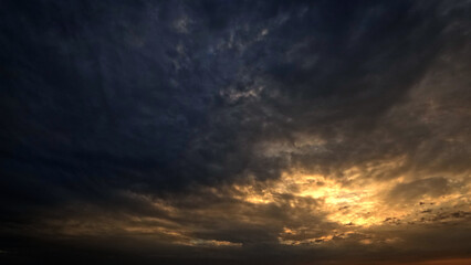 beautiful sunset goldish clouds on the sky background - photo of nature