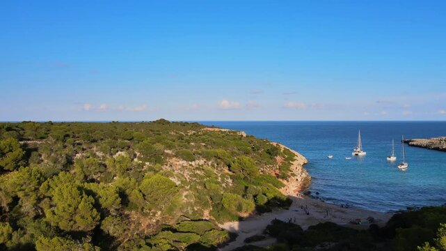 Experience the stunning natural beauty of Cala Varques, Mallorca, with its lush greenery, peaceful beaches, and serene blue waters. Perfect for nature lovers and seaside enthusiasts.