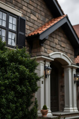 Luxury Home Exterior: Brick and Stone Facade, Elegant Design