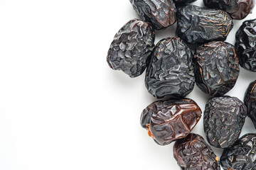 Dates fruit ajwa or kurma ajwa, isolated on white background