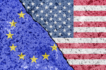 The crack between the flags of the United States and the European Union. The concept of problems in...