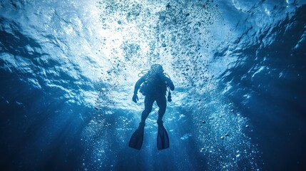 Underwater Diver Silhouette in Deep Blue Ocean