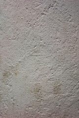 white textured rugged wall as background or wallpaper