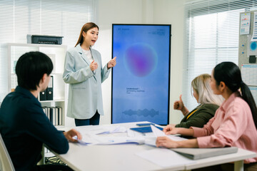 Fototapeta premium A business people and Startup marketing team, Smiling businesspeople having a discussion in an office. Teamwork, Strategy, Team Brainstorming Strategy Development for Corporate Growth Session.