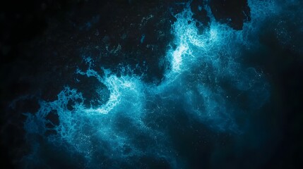 Obraz premium Vibrant cosmic nebula, swirling blue and teal gases in a dark expanse, evokes wonder and mystery in space exploration.