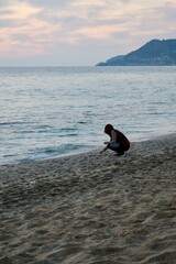 Man beach sunset. High quality photo