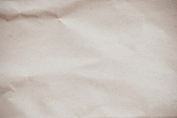 Old paper vintage texture surface for background. Recycle pale brown paper crumpled texture, Cream color recycled kraft paper texture blank with copy space for text.