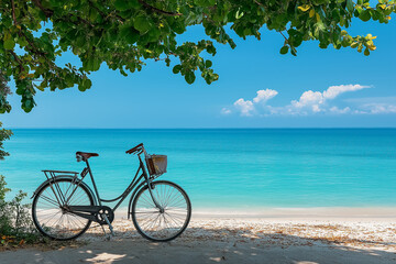 Fototapeta premium A bike parked near a beach with the ocean in the background