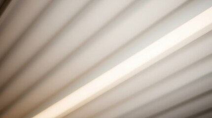 Obraz premium Interesting interplay of light and shadow from modern ceiling panels in a contemporary office space