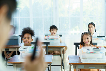 Group of diverse children enjoy learning about the STEM.