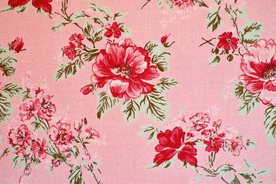 Pink Fabric Displays Red Floral Pattern Design