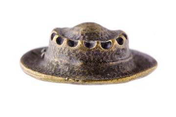 Bronze hat decoration, isolated against a white background.