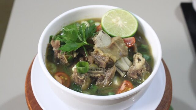 A bowl of beef soup. A bowl of delicious oxtail soup