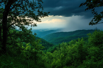 Obraz premium Heavy Rain Begins to Fall Under Dark Clouds.