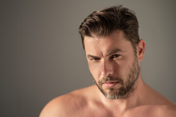 Close up portrait of handsome man. Portrait of shirtless man for skincare and beauty concepts....