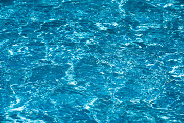 Blue ripped water in swimming pool, water pool texture and surface water backgraund.