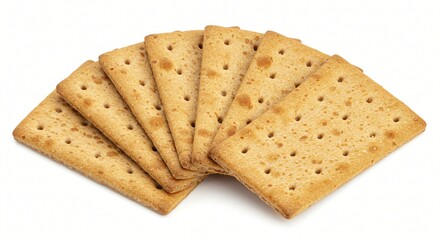 Fototapeta premium A neatly fanned-out stack of golden-brown crisp crackers with a perforated surface, showcasing their texture and baked appearance against a clean white background.